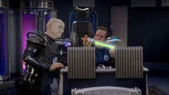 Rimmer inspects the quantum rod on the bridge of SS Trojan