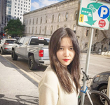 Yeri next to a street sign 2