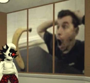 A man incredibly surprised by a banana standing up on its own.