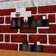 A picture of Popbob's Minecraft skin texture, a well known Minecraft player on the wall.