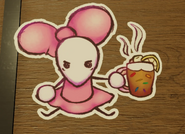 Mozelle holding a warm cookie cup with a lemon slice