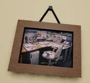 A painting depicting an office desk made of mainly magazines.