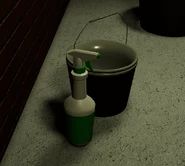 Green Spray Bottle in Funny Maze