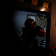 Reddy standing at the left door.