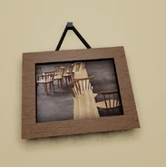 A painting depicting a long table and chairs, some clipping into the table.