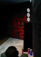 Three coins stacked on top of the vending machine.