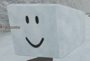 A block shaped snowball with the default face.