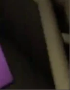 A tiny part of Melanie's jacket, seen through a teaser.