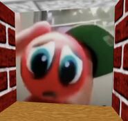 A real life Red Teddy on a wall.
