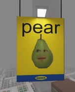 A sign with Pear from Annoying Orange, with the word "pear" written above it.