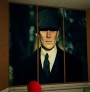 Oppenheimer wearing a hat that obscures his eyes.