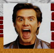 A picture of the actor Jim Carrey on a wall.
