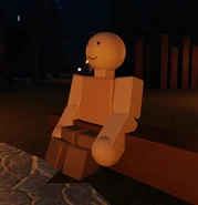 Wallter near the campfire.