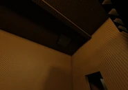 A vent in SCP-173's containment chamber, containing a Floor Ticket.