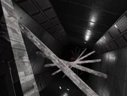 An obstacle with thin, winding beams.