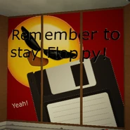 A Floppy Shoppy advertisiment featuring a floppy disk, a distorted emoji with sunglasses, and text saying to, "Remember to stay Floppy! Yeah!"