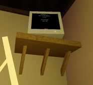 A TV with white credits rolling over a black background on the wall behind crem.