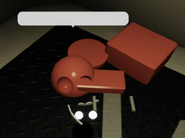 A glitch showing Reddy as a couple pieces of their model in the elevator.