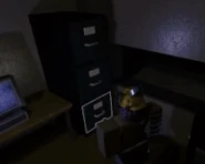 A player finding a Floor Ticket from a drawer in the hidden room to the left.