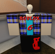 Lampert, who lost his lampshade, has his face on his lightbulb, and now wears clothes.