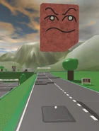 A coin beneath the falling block hazard.