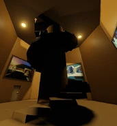 A room with a tall, winding staircase.