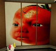 A tomato with a baby's face.