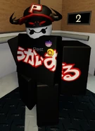 Pest wearing an acespec pride badge and a intersex pride badge for pride month.