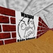 A picture of the Rage Face meme on the wall, with the text "Warning, Rage Inbound!".