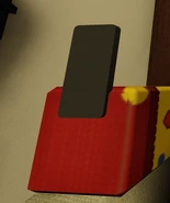 The MusicPlayer being held from the back.