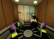 Folly inside the elevator compared with three Poobs.