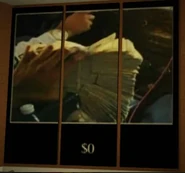 Someone holding a large pile of money bills with caption saying "$0".