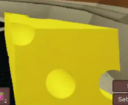 Cheese being held.