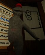 A Banrey clipping true the update board while having a red cap on.