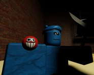 A player painted blue, and having their Squishy painted red.