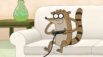 S5E01.015 Rigby Happily Playing Video Games