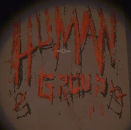 Graffiti of the Human Group's logo, with semibots crossed out showing anti-semibot attitude.
