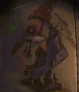 A slightly vandalized painting showing a gnome.