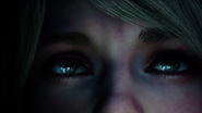 A close up of Ashley's eyes from the reveal trailer