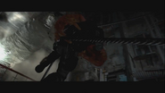 Iluzija grabbing a BSAA operator as he rappels down a rope.