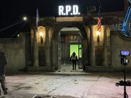 The front gates of the R.P.D. and a large green screen is placed around the set and behind the doors that (presumably) Leon and Claire will open as the crew prepares for filming.