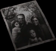 The version of the family photo Barry carries in the remake.