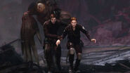 Leon and Angela running from a mutated Curtis Miller.