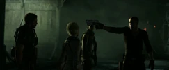 Jake points a gun at Chris after he finds out that he killed his father.