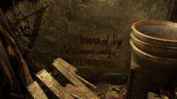 Resident Evil 4 remake - Hunter's Lodge writing on the wall 2