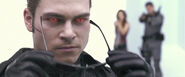 Wesker taking off his sunglasses. The red cat-like eyes were the side-effects of the T-Virus.