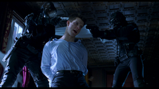 Resident Evil film - Matt gets detained by Sanitation Team.png