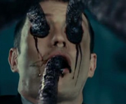 Slater's death and the hands of the mutated Isaacs.