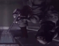 Nikolai in Outbreak holding his own firearm