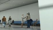 Eddie getting ready with a female reporter inside the Harvardville Airport.